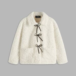 Cider plush bow coat. Faux cream fur with dark brown bows sz m, like new